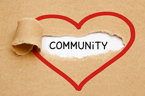 Community written inside of a heart