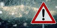 Rain with warning sign